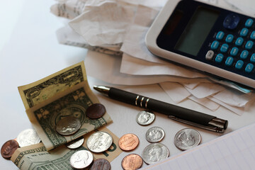 budget economy and finance background with money pen calculator and receipts