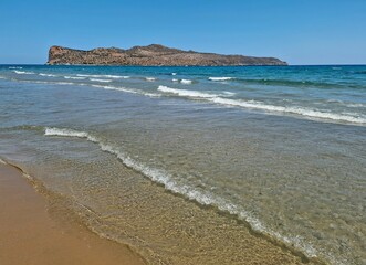 Sandy beach in Agia Marina resort on Crete, Greece, Europe.