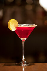 cocktail with lemon on the table