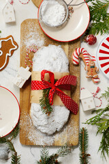 Christmas curd stollen on a Christmas rustic background