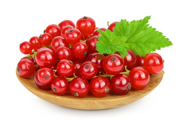 Red currant berries in a wooden bowl isolated on white background