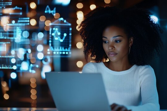A young professional analyzes abstract digital graphs on her computer in a trendy office, epitomizing modern technological adeptness and analytical skills.