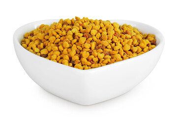 Bee pollen grains in ceramic bowl isolated on white background