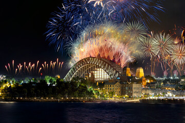 Sydney Harbour Bridge New Years Eve fireworks, colourful NYE fire works lighting the night skies...