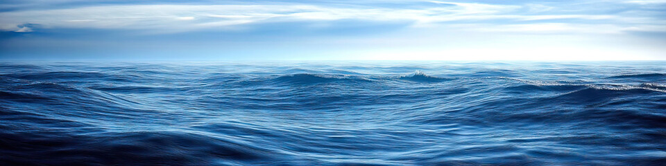 Fototapeta premium The vast expanse of the ocean stretches out before you, with nothing but the sky above and the gentle rocking of the waves below.