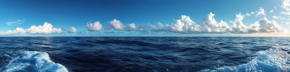 Fototapeta premium The vast expanse of the ocean stretches out before you, with nothing but the sky above and the gentle rocking of the waves below.