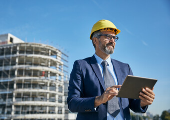 businessman construction site business architect building engineer builder tablet helmet...