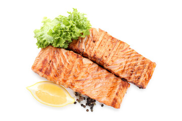 Delicious grilled salmon fillets with peppercorns, lemon and lettuce isolated on white, top view
