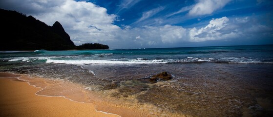 Wide shot of beautiful ocean waves from beach