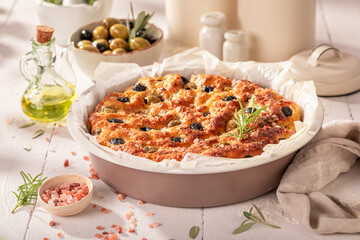 Tasty focaccia made of flour, olives, salt and oil.