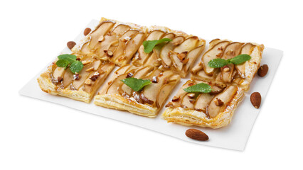 Pieces of tasty puff pastry pie with pears, mint and almonds isolated on white