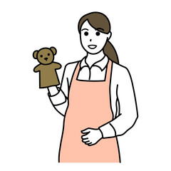 パペットを持った女性保育士のイラスト