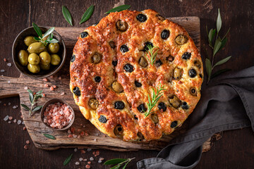 Hot focaccia made of olives and sea salt.