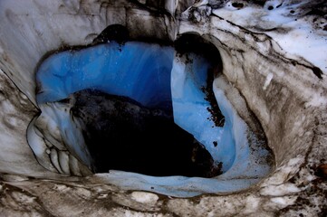 Ice and stone leading into darkness below