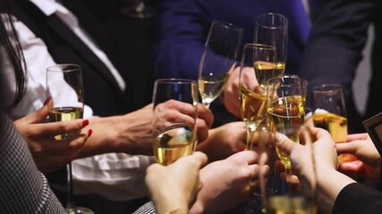 Group of businessmen celebrate, closing successful concluded deal, guests clinking raise glasses with alcohol, sparkling wine, toasting and cheering, colleagues team in office on corporate party event