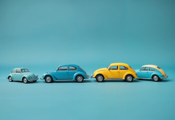 Vintage Cars Lineup Retro Blue, Yellow, and Teal Models