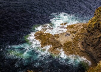 waves crashing on rocks