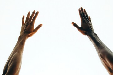 Fototapeta premium Two hands reach upward against a bright background, symbolizing a desire for connection, aspiration, and hope. The moment conveys a profound sense of yearning and elevation.