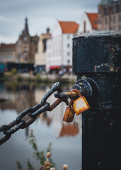 lock and chain on bridge