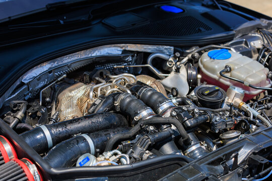 BMW M5 Engine Close-Up, Showcasing Intricate Turbo System and Engineering. July 2, 2023. Liadoveni, Moldova.