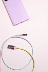 Obraz premium Colorful plug charger cable, usb connector for phone, copy space