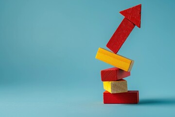 Colorful wooden blocks arranged in an upward direction, symbolizing growth and success. Creative concept of development and progress with vibrant colors.