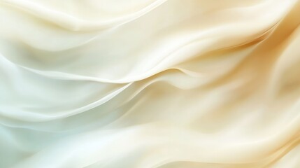 Obraz premium Close-up of smooth, flowing, ivory satin fabric with soft light.