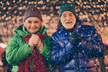 Two people retired pensioner married couple woman man enjoy x-mas christmas jolly holly advent eve...