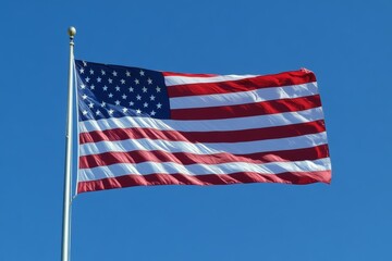 Obraz premium American flag waving against clear blue sky