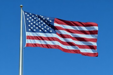 Fototapeta premium American flag waving on clear blue sky background