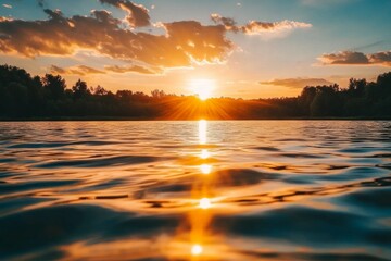 Obraz premium Stunning sunset over calm lake reflecting vibrant colors