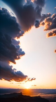 Sunlit Peaks Surrounded by Soft Clouds