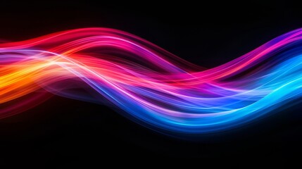 Fototapeta premium Colorful abstract waves on a black background.