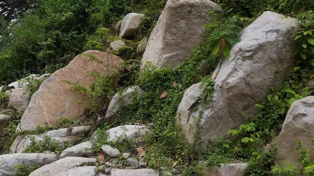 Large rocks lying on the edge of a mountain slope, aceh - indonesia