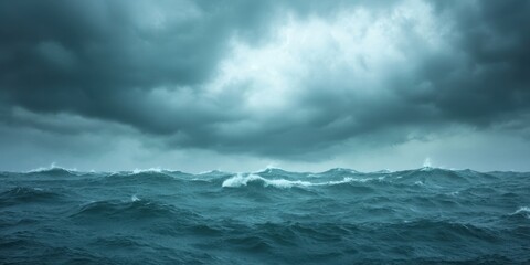 Fototapeta premium A dramatic view of stormy ocean waves under a dark, cloudy sky highlighting nature's power.