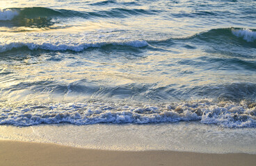 Waves splashing background. Ocean waves background. Ocean or sea waves. Sky and clouds background.