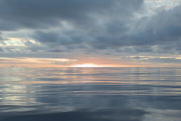 Sunset with clouds over the ocean. Rain is about to come