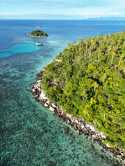 Indonesia Anambas Islands - Drone view Telaga Island coastline along the island