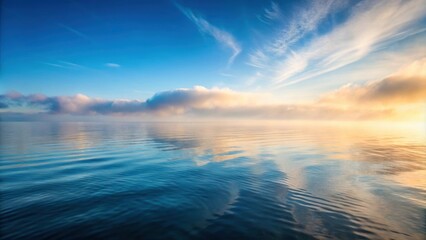 Fototapeta premium Sea ripple water with morning fog, ocean, serene, peaceful, tranquil, misty, foggy, dawn, water, rippling, reflections, nature