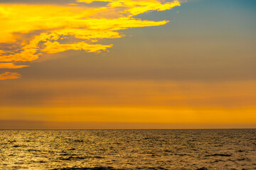 Enjoy a panoramic view of the skyline. The sun rises in the morning sky with colorful clouds. and beautiful cloud patterns In the soft light of the morning	