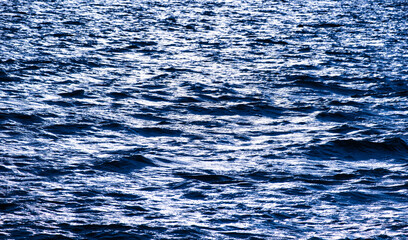 Nature of the beach and water sea Summer with sunshine, sandy beaches, clear blue waters sparkling against the blue sky. On an island with good ecology and environment Background for summer vacation