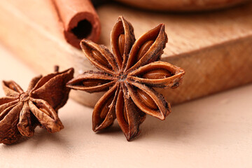 Aromatic star anise spice on color table, closeup