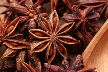 Aromatic star anise as background, closeup