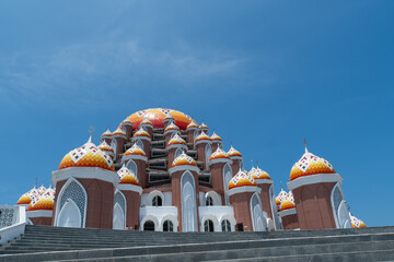 Close-up of the 99 Domes Mosque at Losari Beach, Makassar, on a cloudy morning. Beautiful landmark of Makassar City.