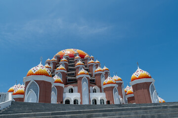 Close-up of the 99 Domes Mosque at Losari Beach, Makassar, on a cloudy morning. Beautiful landmark of Makassar City.