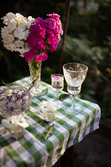 Well served table with glasses and flowers