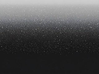 Obraz premium Abstract grayscale gradient background with subtle glitter texture.