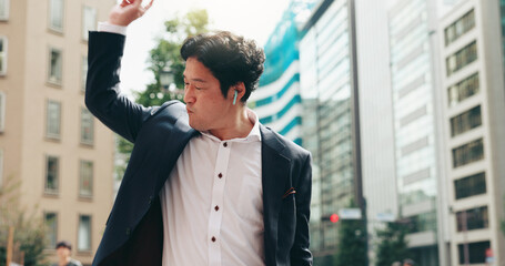 Business, man and dance with earphones in city for listening to music, energy and podcast...