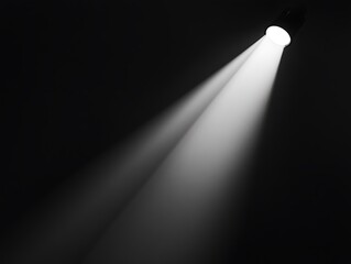 Bright light beam in darkness.