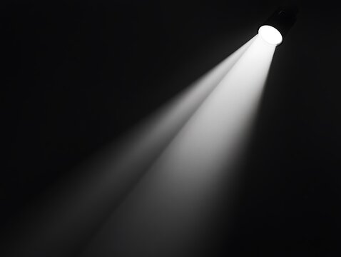 Bright light beam in darkness.